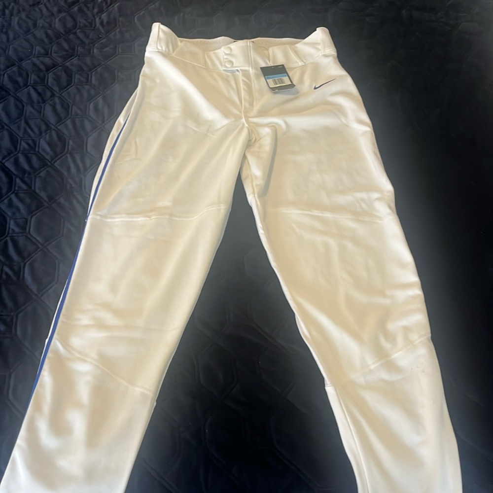 Men's med nike baseball pants. NWT, white with blue piping. Style BQ5489-108